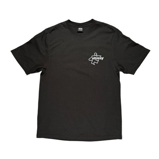 Black pigment dyed stussy t-shirt with a logo on a white surface