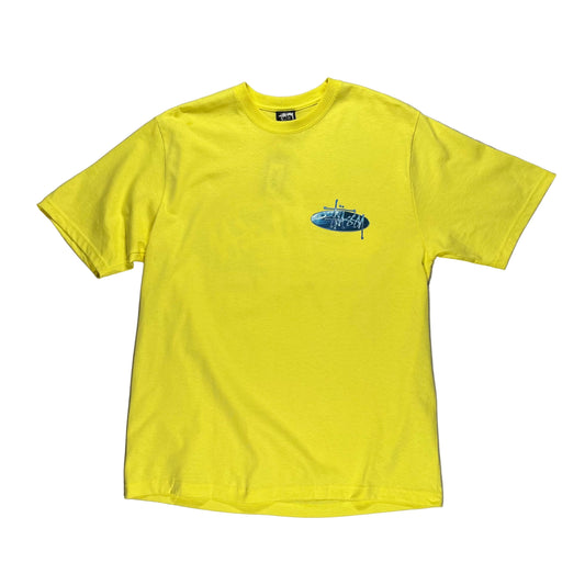 Yellow t-shirt with a small logo on a white surface