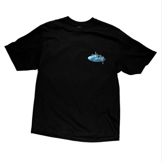 Black t-shirt with a small blue logo on a white surface