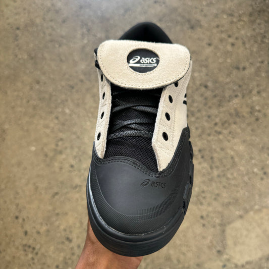 black rubber and cream suede sneaker with black sole , front view