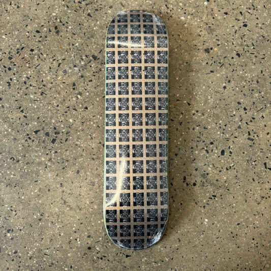gold and black plaid on skate deck