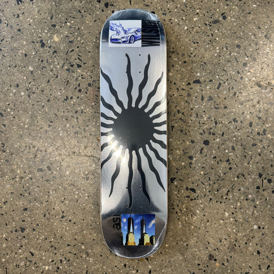 black sun on silver skate deck
