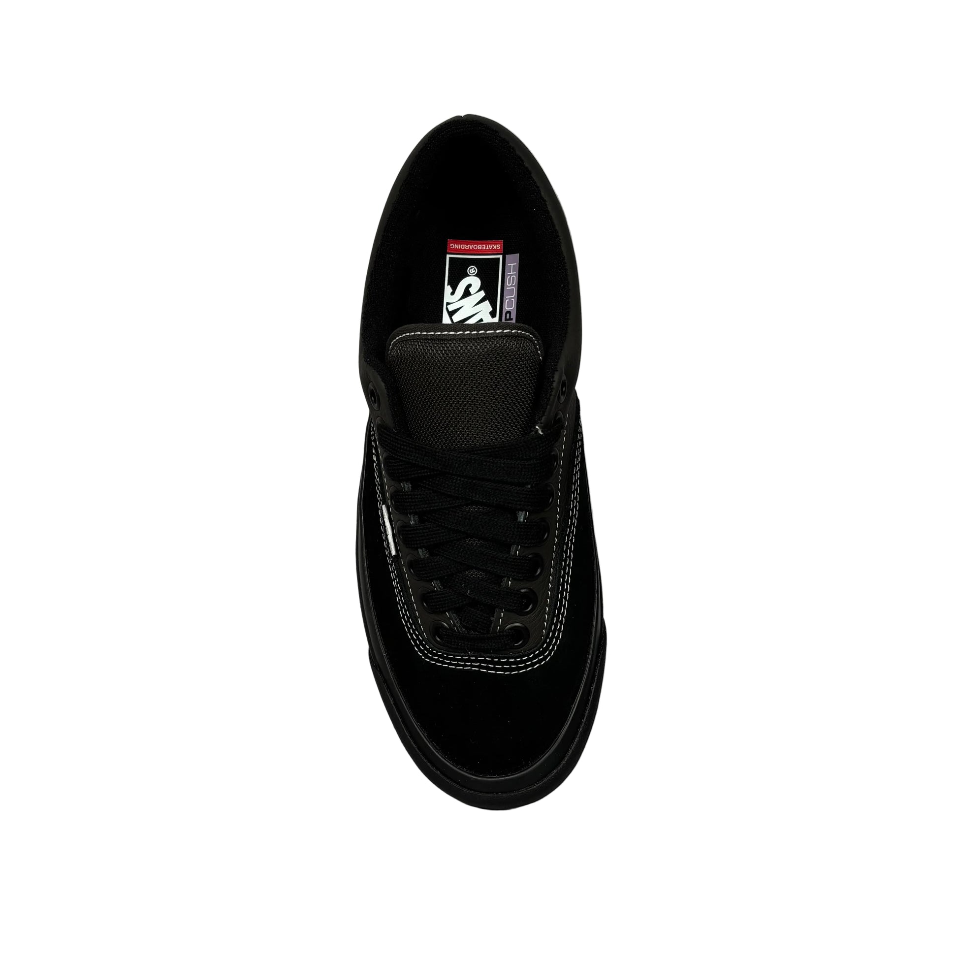 top down view of Black sneaker on a white surface