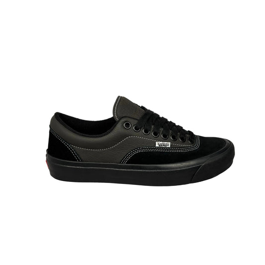 Black suede and leather sneaker with on a white background