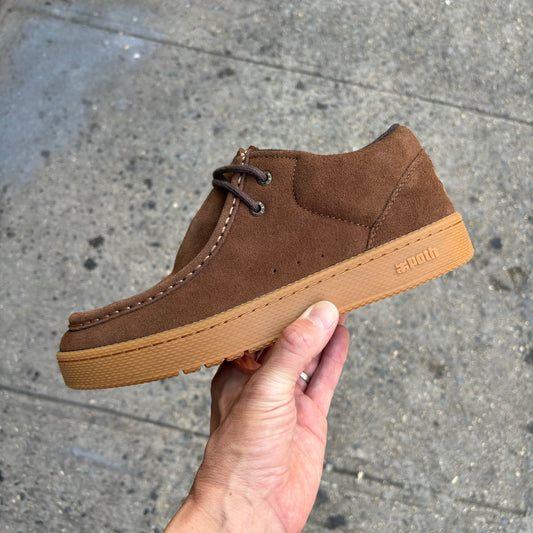 SIde view of brown suede sneaker
