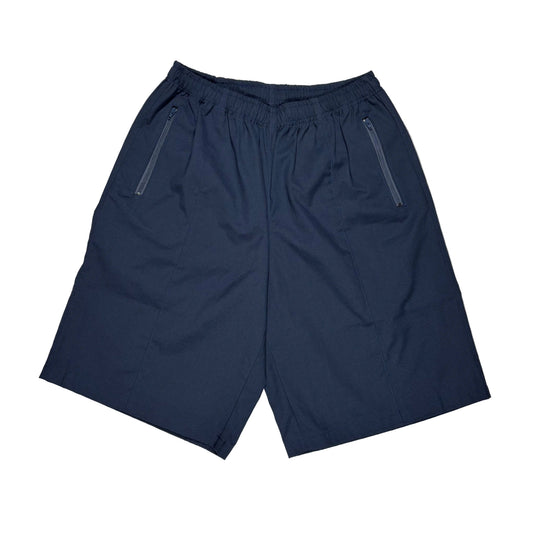 A pair of navy blue athletic shorts with an elastic waistband and two zippered side pockets, laid flat on a white surface