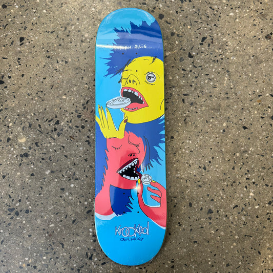 blue, red, and yellow abstract faces on light blue skate deck