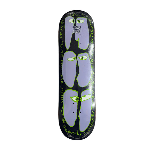 Skateboard deck with abstract design on a white surface