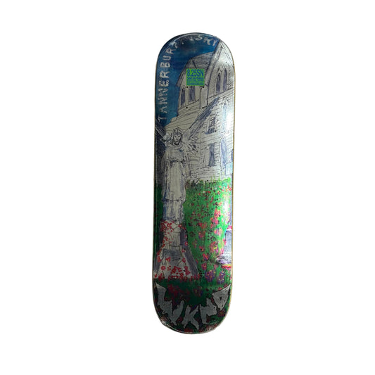 Skateboard deck with artistic design on a white surface