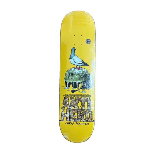 Yellow skateboard deck with a design of a pigeon on a robot, placed on a white surface