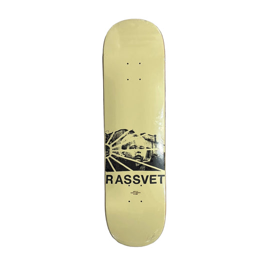 Skateboard deck with 'RASSVET' logo on a white surface