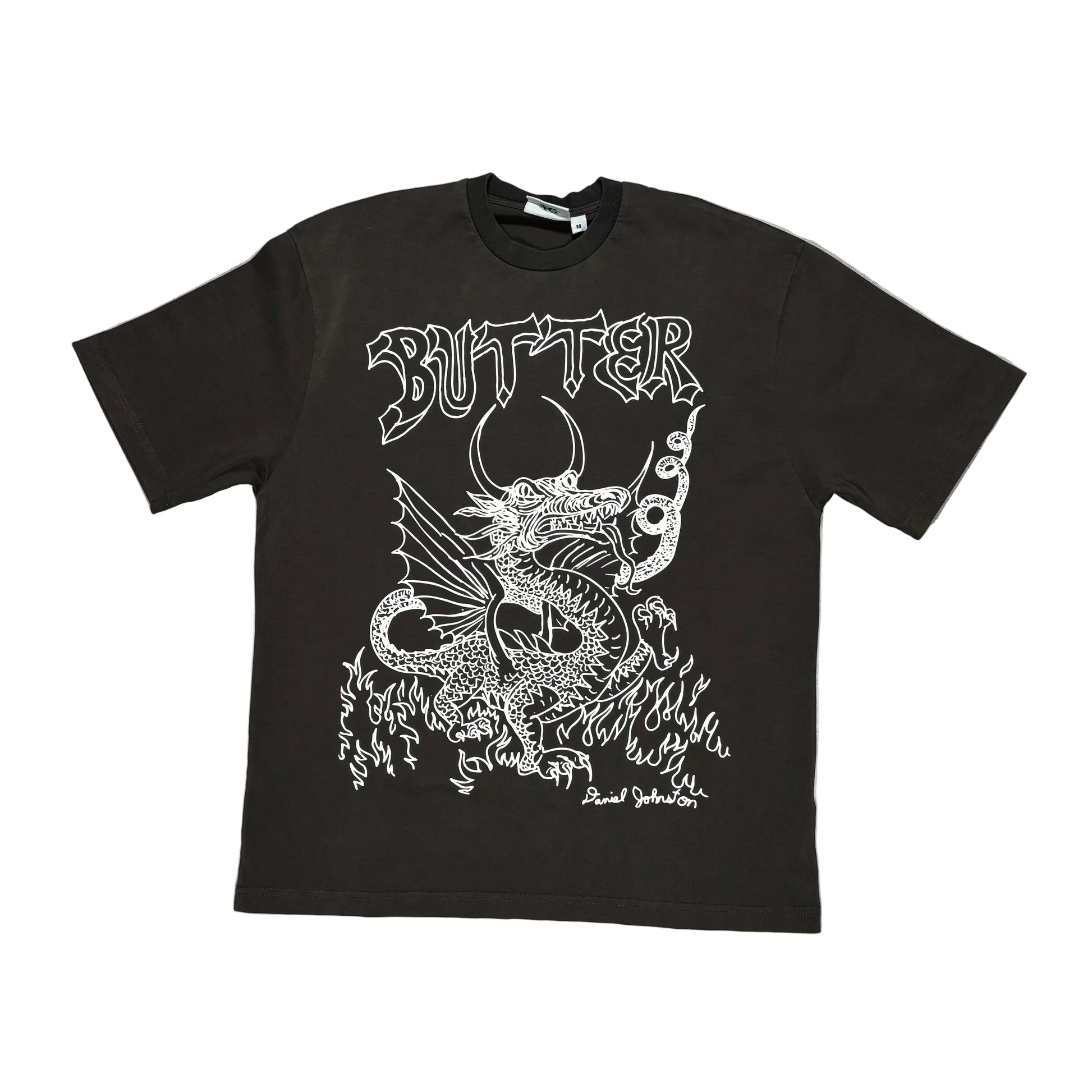 Black t-shirt with white graphic design on a white surface