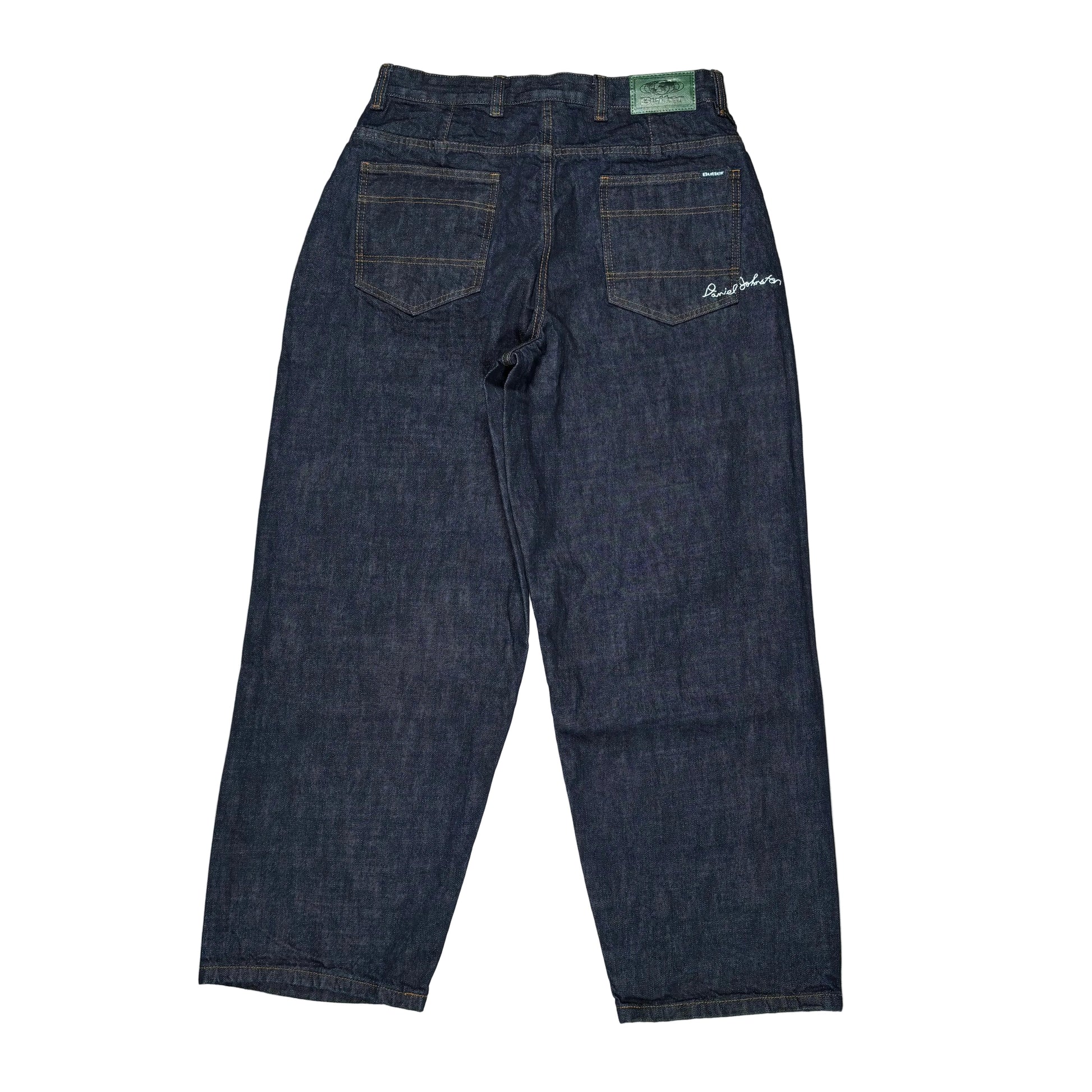 Pair of blue jeans on a white background with visible brand logo