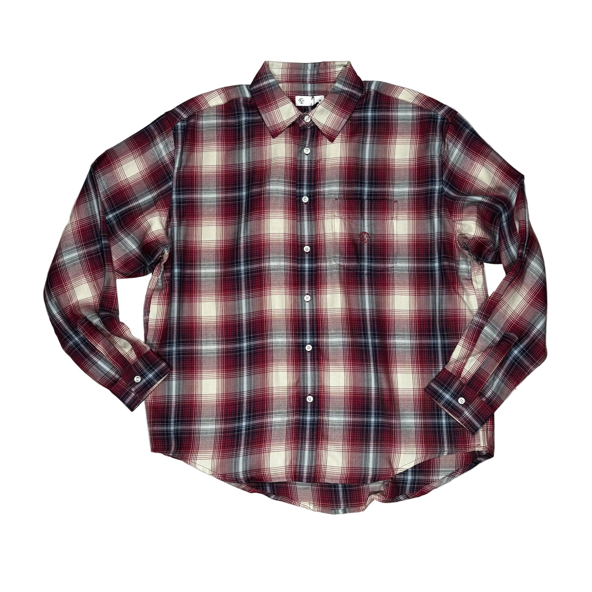 Plaid shirt on a white surface 