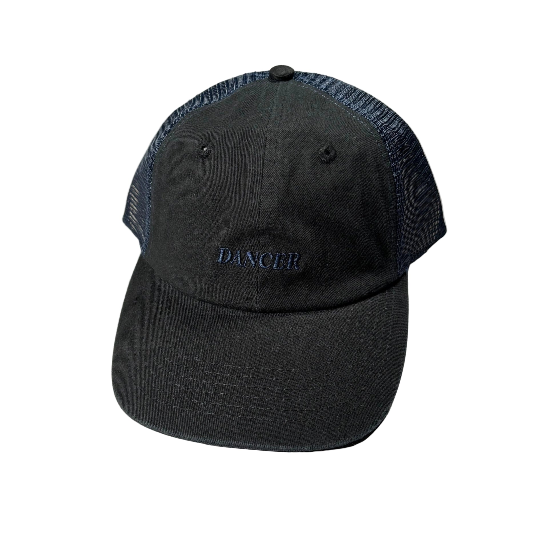 Black cap with 'DANCER' embroidery on a white surface