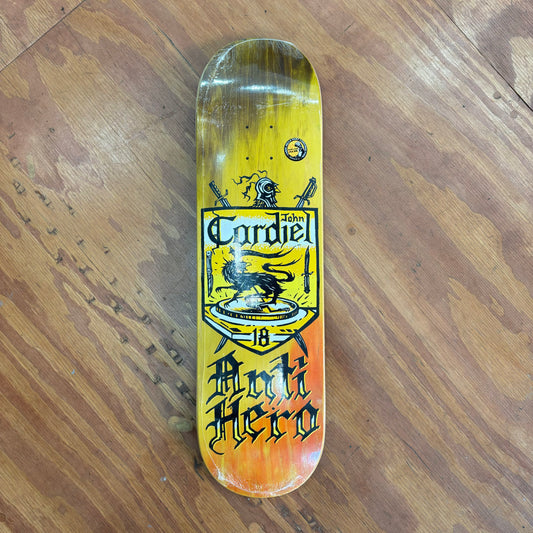 Cardiel coat of arms drawn logo on woodgrain skate deck