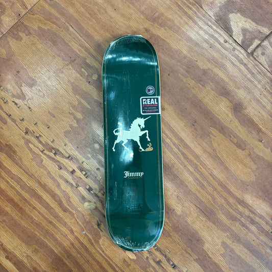 Green background with white unicorn on skateboard deck