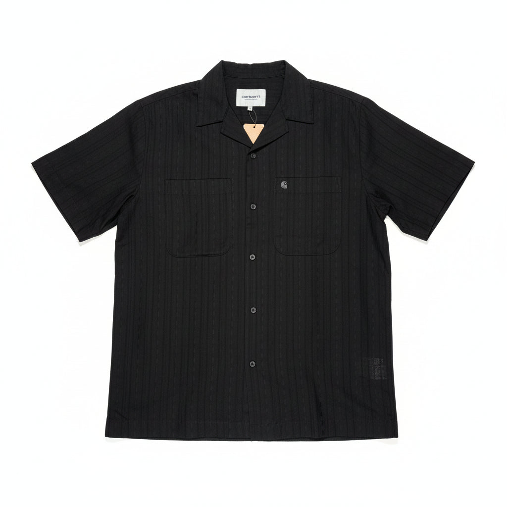 Black short-sleeve shirt on a white surface