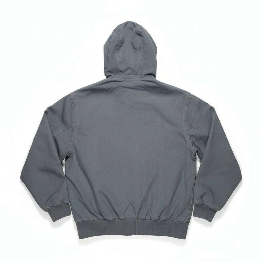 rear of dusty blue hooded jacket on a white surface 