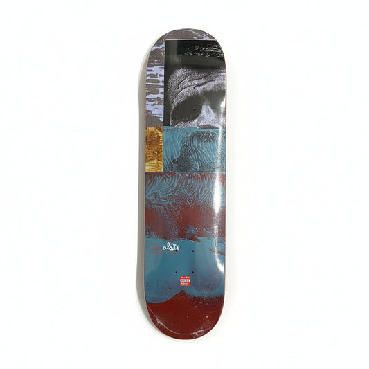 Skateboard deck with a collage style design on a white surface