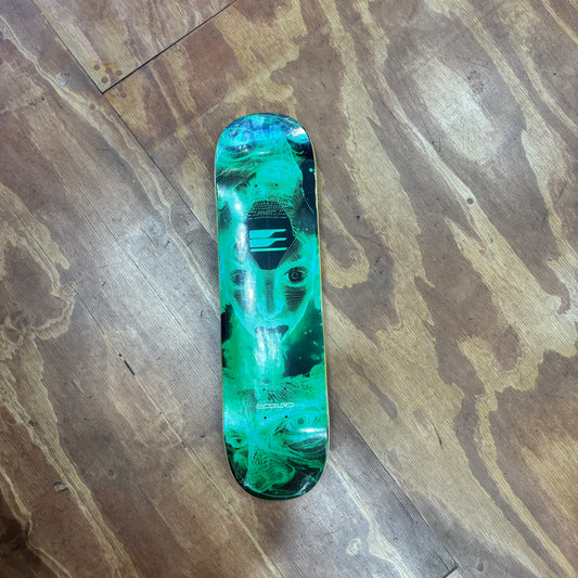 Green cyber alien head looking graphic on skateboard deck