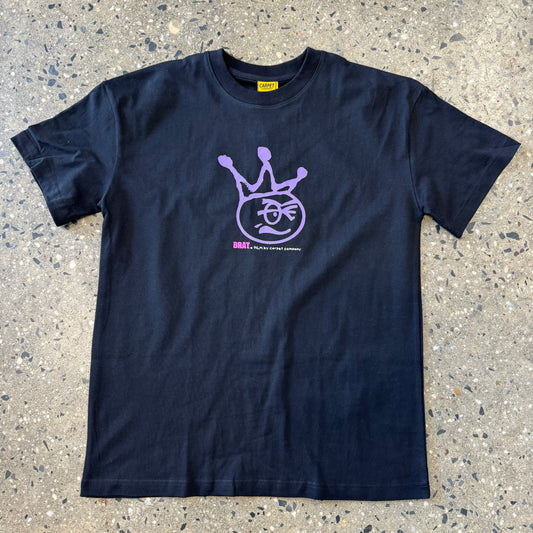 round head with crown in purple ink in center chest on black t-shirt with small pink brat logo