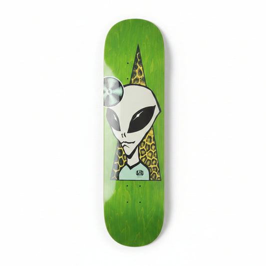 Green skateboard deck with alien design on a white surface