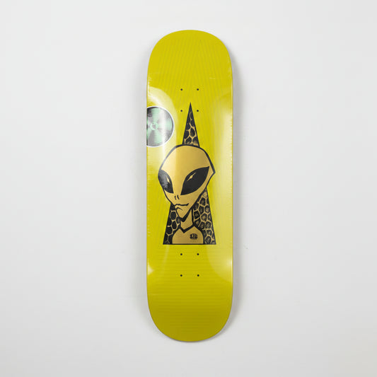 Yellow skateboard deck with alien design on a white surface