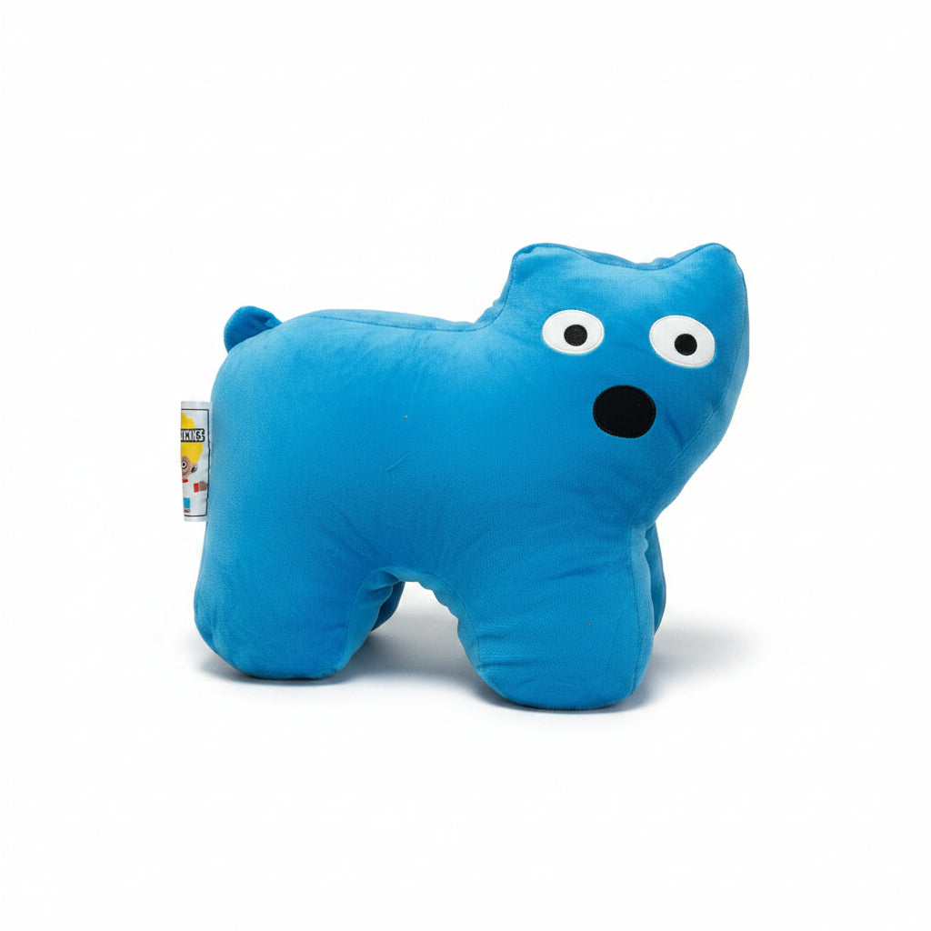 Blue plush toy resembling a cat on a white
 surface
