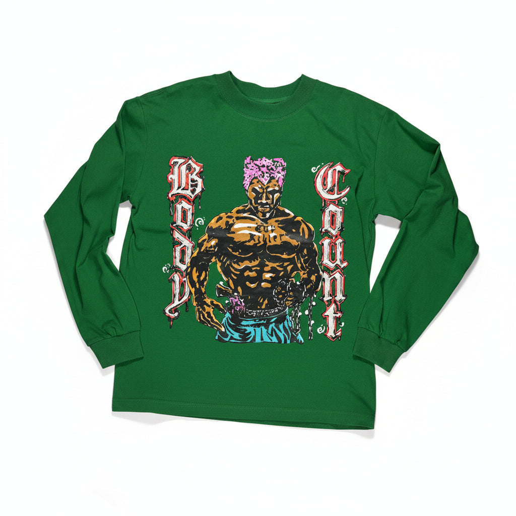 Green long-sleeve shirt with graphic design on a white surface