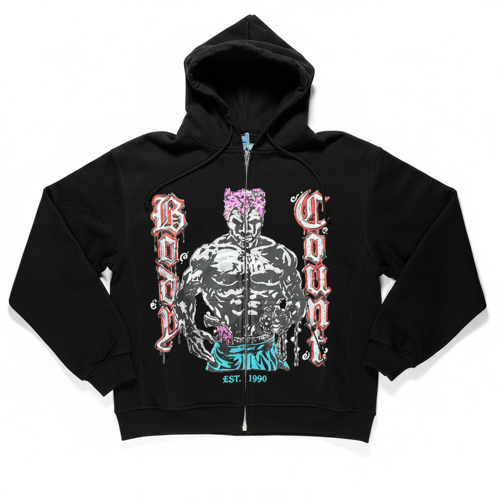 Black hoodie with graphic design on a white surface