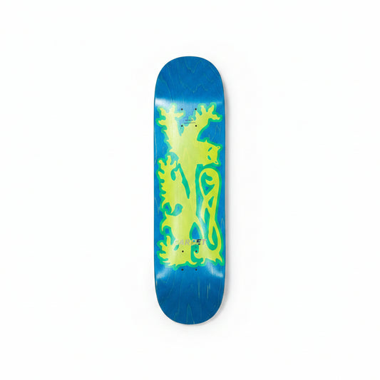 Skateboard deck with blue and green design on a white surface