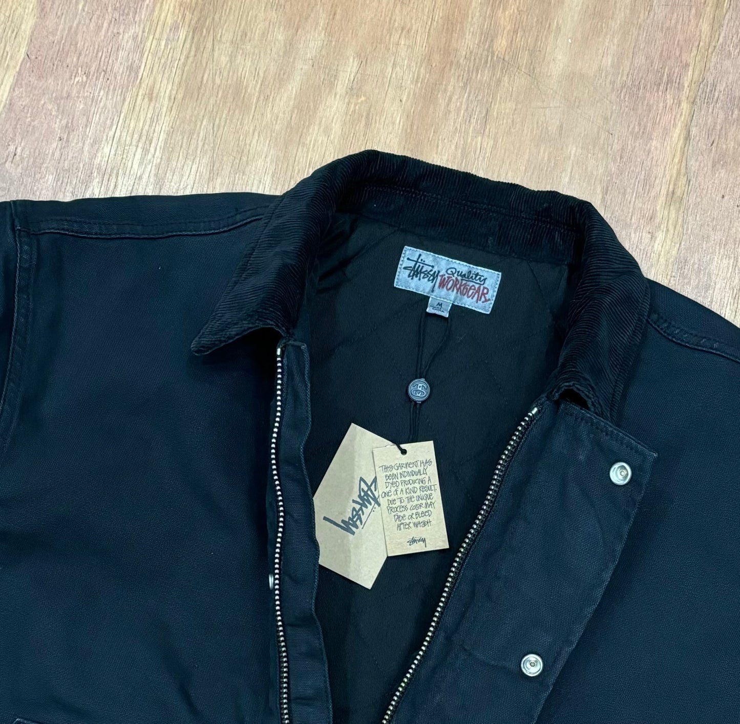 closeup view of collar and zipper of stussy workgear jacket