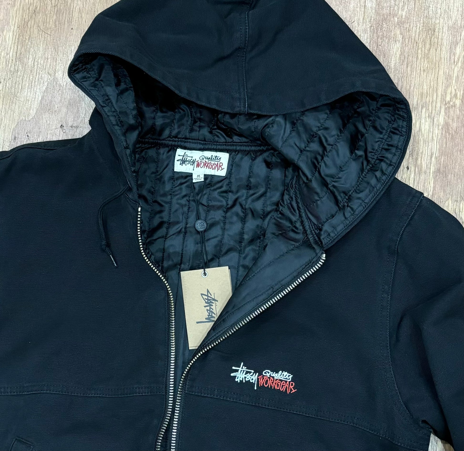 close up view of hood and liner on stussy work jacket