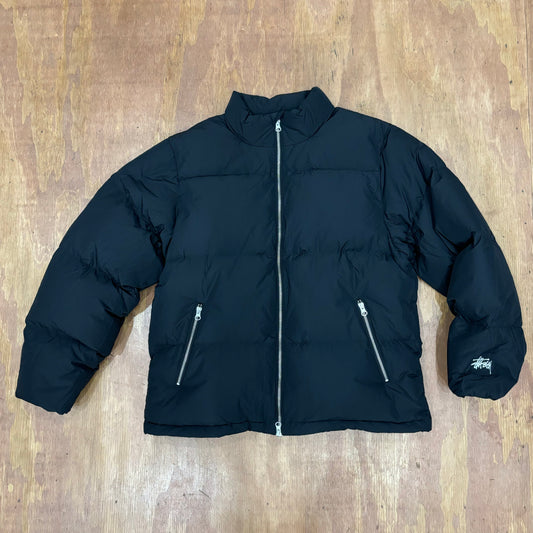 Front view of stussy nylon down jacket