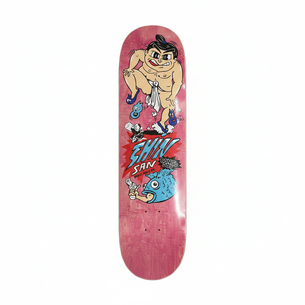 Skateboard deck with cartoon character and 'Shin San' branding on a white surface.