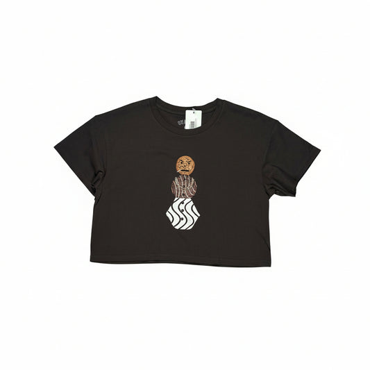 Black t-shirt with graphic design on a white surface
