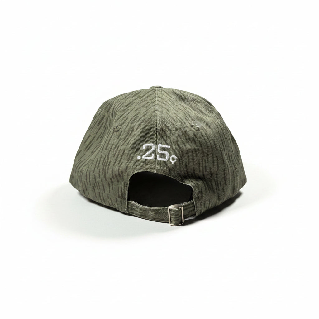 Green camouflage baseball cap with '25' embroidery on a white surface