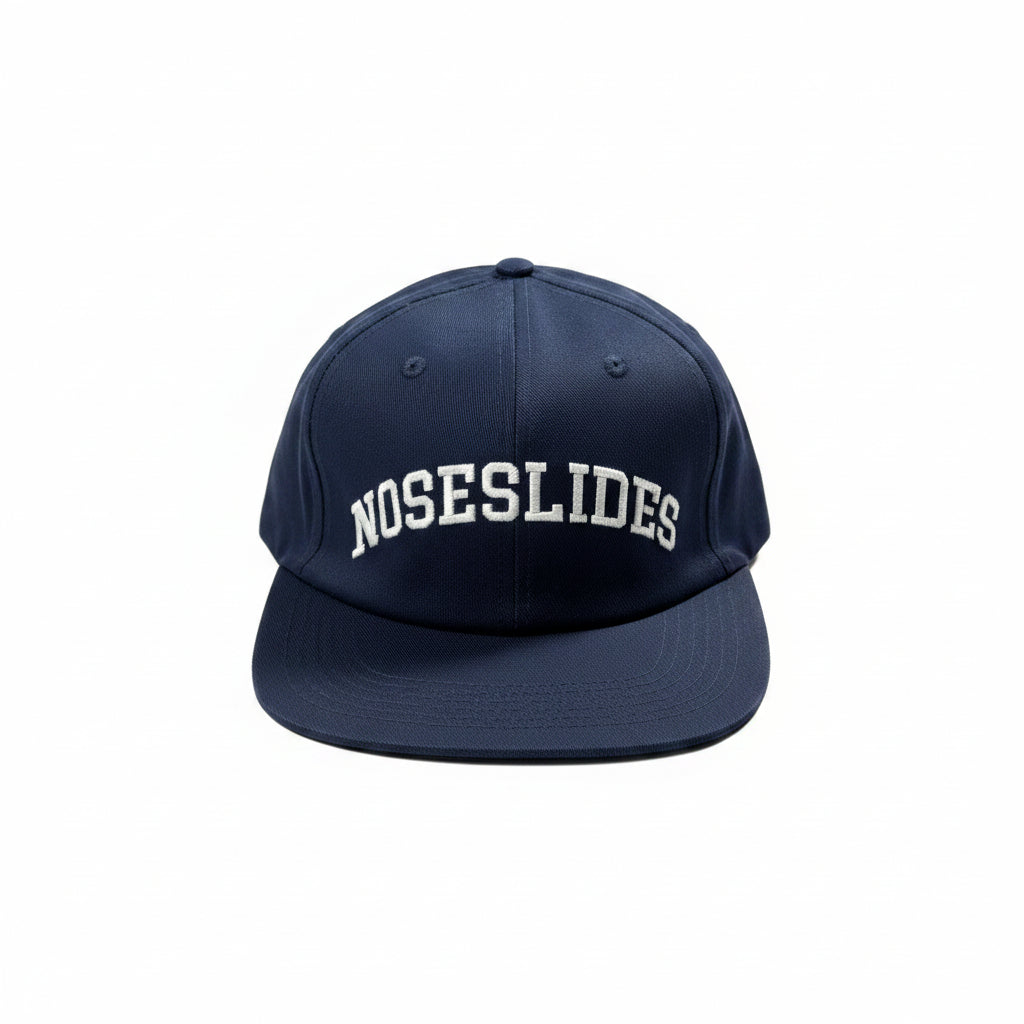 navy cap with NOSESLIDES logo on front