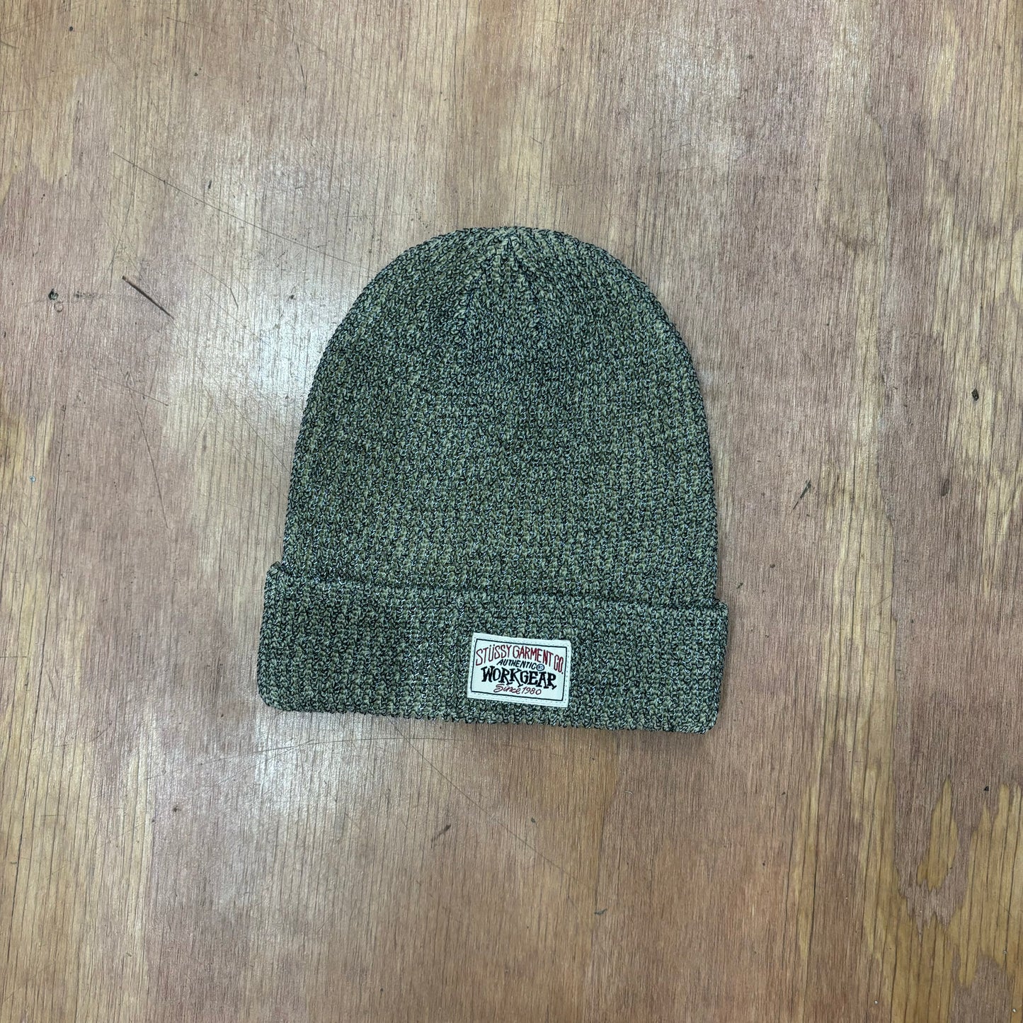 front view of khaki reflective yarn beanie