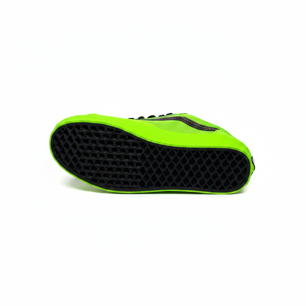 Green and black sneaker sole on a white background