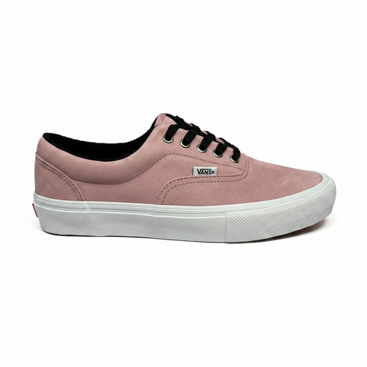 Pink sneaker with white sole on a white background