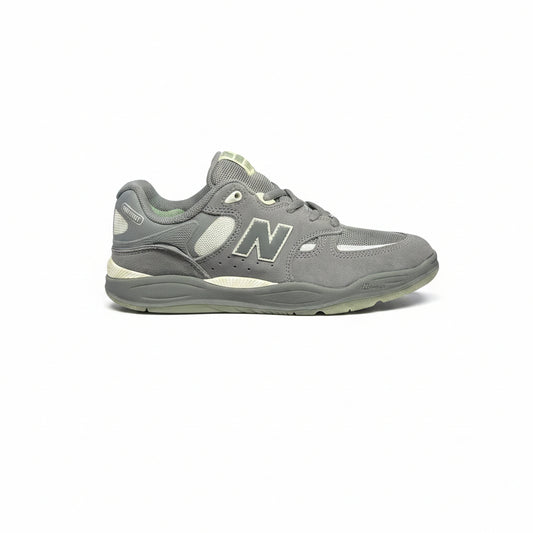 Gray New Balance sneaker on a white background