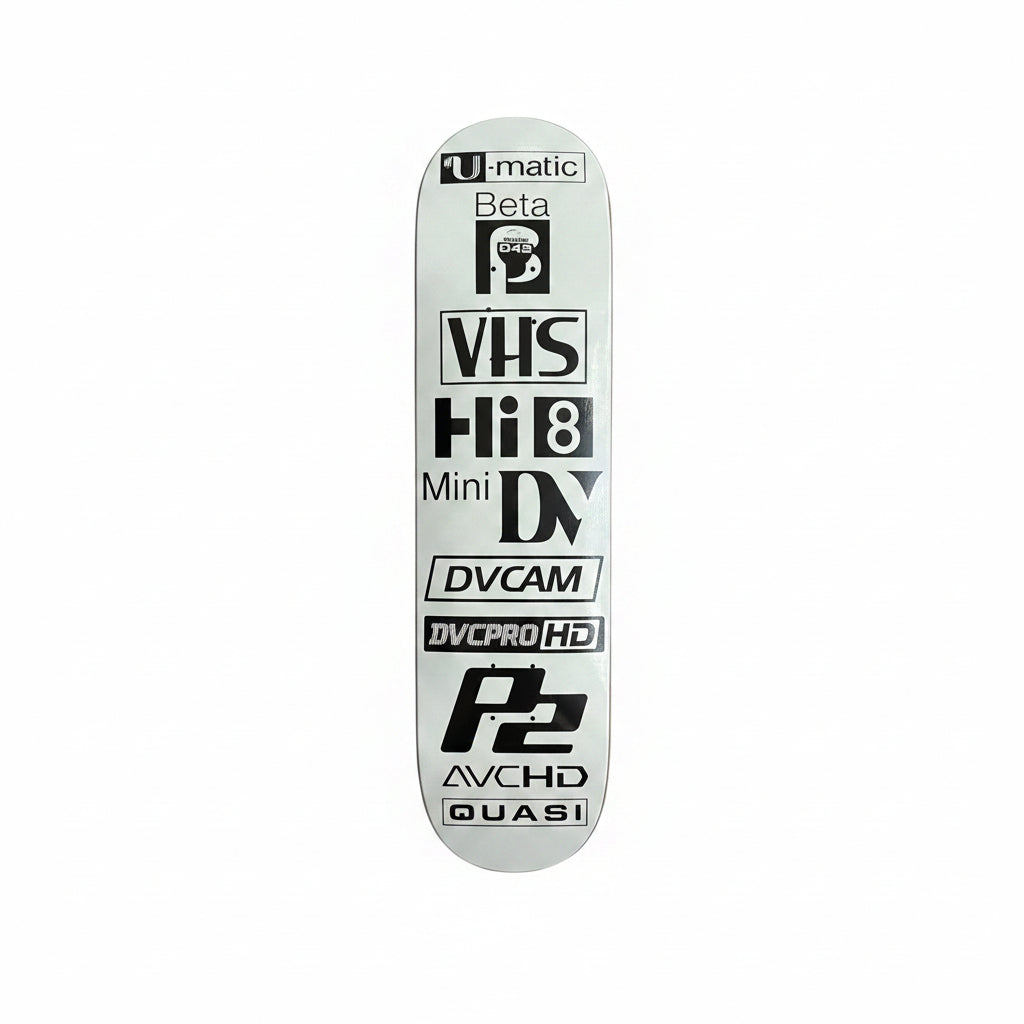 Skateboard deck with vintage technology logos on a white surface