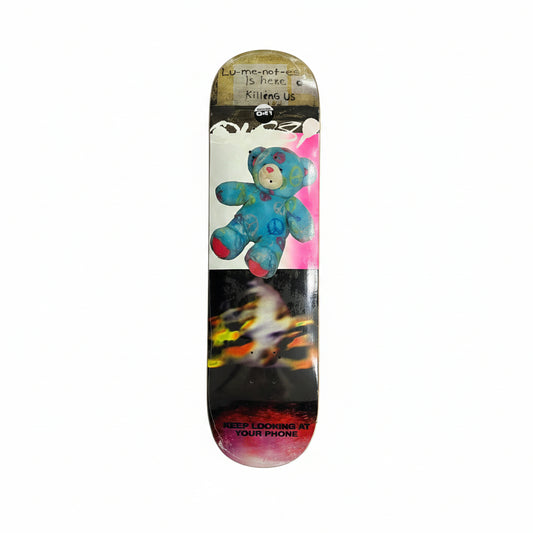 Skateboard deck with colorful bear design on a white surface