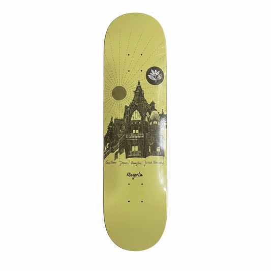 yellow skateboard deck with cathedral in the background