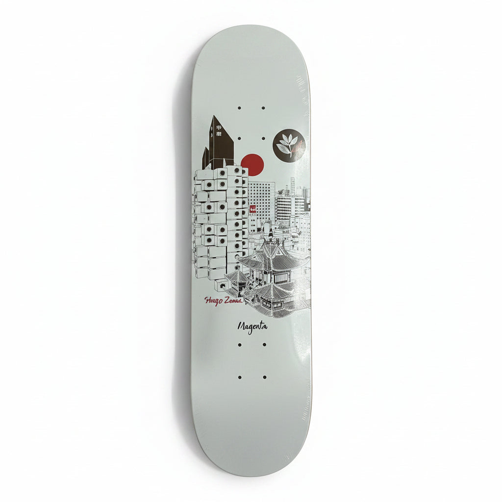 white skateboard deck with a city skyline graphic
