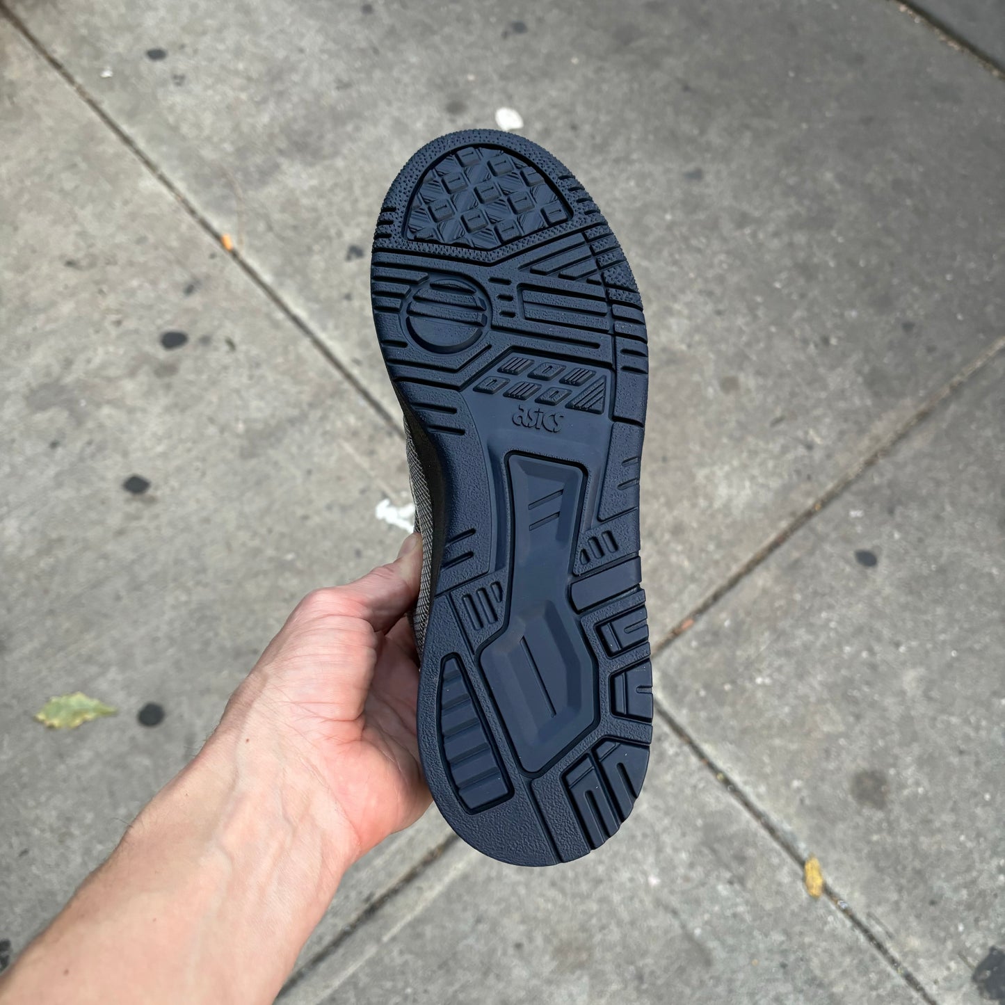 View of dark navy sole on skateboard sneaker