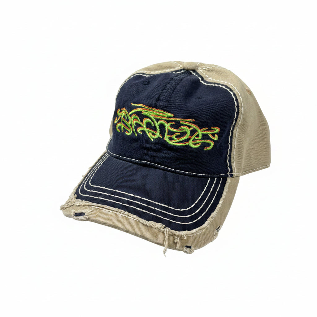 front view of broken in looking cap with tribal logo