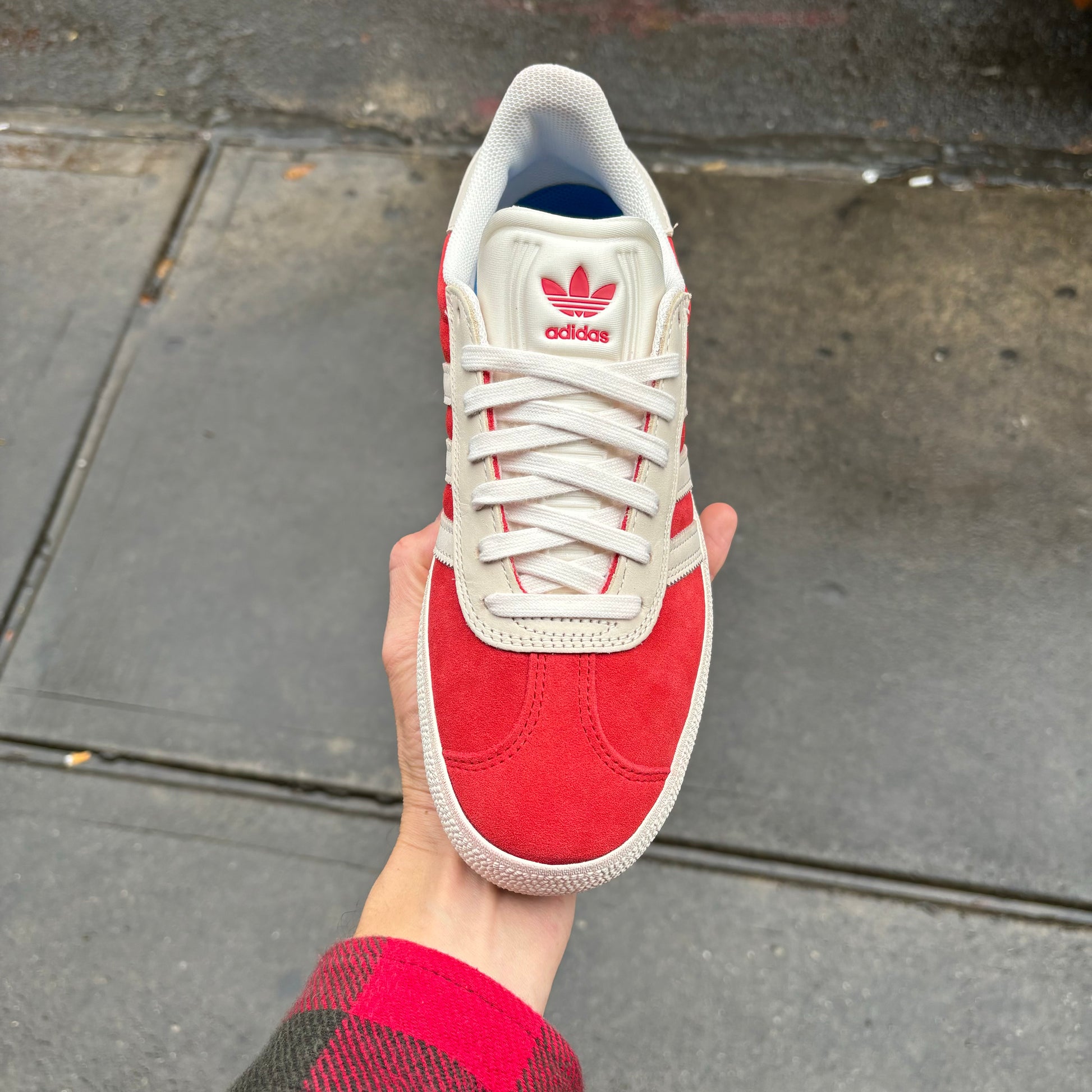 top down view of red and white suede skate sneaker